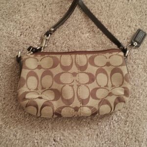 * Coach wristlet
